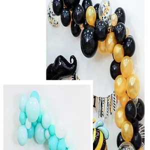 Detailed view of 5m irregular balloon arch kits in black-gold and blue-white color combinations