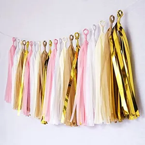 Colorful paper and foil tassels garland for birthday party and wedding decorations.