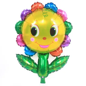 Vibrant sunflower-shaped foil balloon with a friendly yellow smiley face design