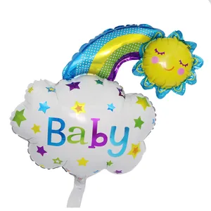 Vibrant rainbow cloud and smiling sun foil balloon detail for baby shower party décor