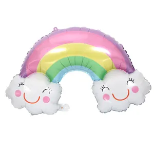 Detail of a colorful rainbow foil balloon featuring cute smiling clouds for party decor