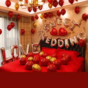 Complete trouwballonnenset met rode en gouden latex en folie ballonnen voor decor