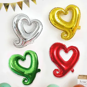 Hook heart-shaped aluminum foil balloons in gold, silver, red, and green for party decor