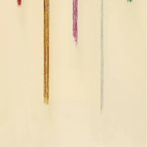 Macro detail view of 1m metallic rain silk fringe for festive party decorations
