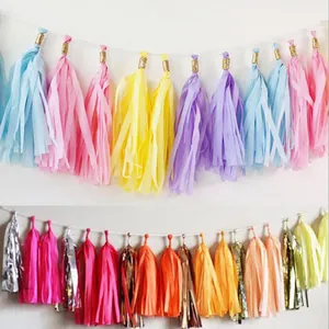 Detailed view of colorful paper tassel garlands for birthday party decorations
