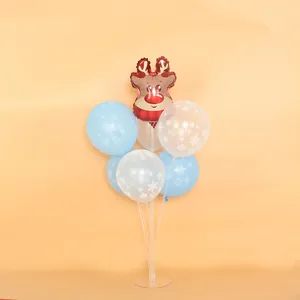Festive Christmas balloon set with reindeer foil and snowflake latex balloons on a table stand