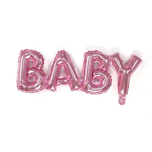 Close-up detail of a 16-inch pink foil BABY script balloon for party and birthday decoration
