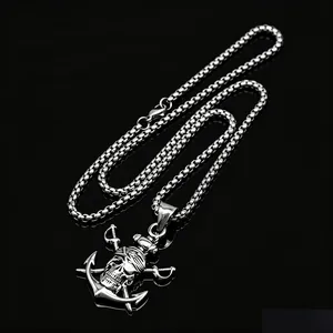 Close-up of stainless steel hip hop necklace with skull anchor and swords pendant