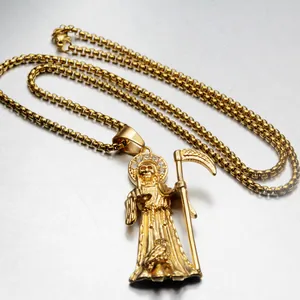 Detailed close-up view of a gold-plated grim reaper skeleton pendant on a steel box chain.