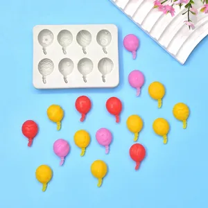 Detail view of the 8-cavity balloon silicone mold with colorful DIY resin pieces