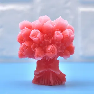 Gros plan sur un bouquet de tulipes roses en relief 3D avec nœud décoratif