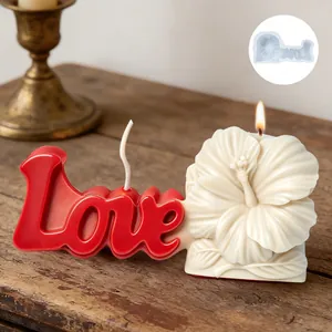 Detailed view of 3D Love letter and hibiscus flower candle made from DIY silicone mold