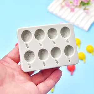 Detailed view of 8-cavity balloon-shaped silicone mold for fondant and resin crafts.