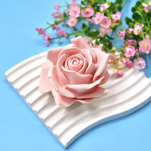 Close-up of a pink 3D rose aromatherapy candle handcrafted using a silicone DIY mold