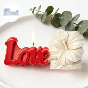 Detailed view of a DIY silicone mold for a 3D Love letter and hibiscus flower candle