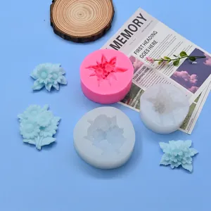 Detailed macro view of 3D flower silicone molds and blue plaster flower samples