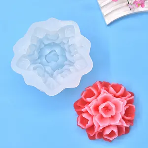 Top-down view of a flower silicone mold with a realistic pink floral candle detail