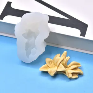 Detailed view of 3D lily flower silicone mold with finished plaster aromatherapy flower