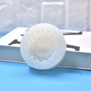 Detailed top view of a translucent sunflower silicone mold for DIY candle making.