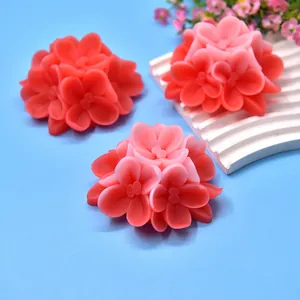 Detailed view of intricate 3D flower clusters crafted from DIY silicone molds in pink tones