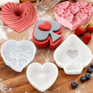 Heart and spade silicone mousse cake molds for Valentine's Day baking and DIY cakes