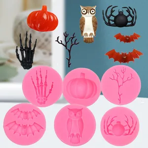 Halloween silicone mold set featuring pumpkin, spider, and bat shapes for DIY baking