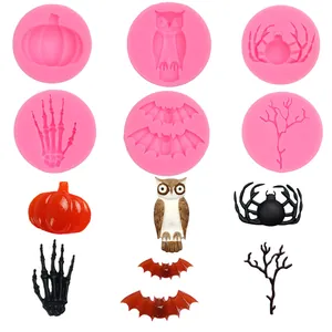 Detailed view of Halloween silicone molds featuring pumpkin, owl, spider, and bat designs.