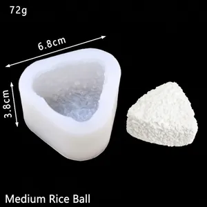 Detail view of triangular onigiri silicone mold showing dimensions 6.8cm and 3.8cm