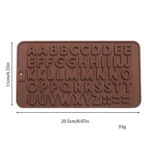 Close-up detail of a brown alphabet silicone mold showing dimensions 20.5cm by 11cm