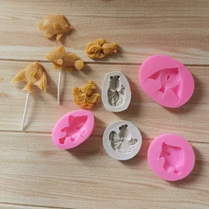 Vue détaillée des moules en silicone en forme de poisson pour sucettes et chocolats
