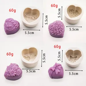 Dettaglio di stampi in silicone a cuore con disegni Amore, Rosa e Fiocco per sapone