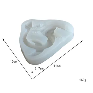Vista detallada de las dimensiones y el peso de 160g del molde de silicona de huevo de dinosaurio