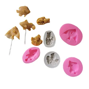 Lot de moules en silicone en forme de poisson pour sucettes et décors de gâteaux.