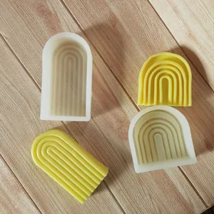Detail view of arch-shaped silicone molds for DIY scented candles and plaster decor