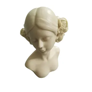 Elegant cream white girl bust sculpture featuring closed eyes and detailed floral hair accessories