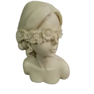 Elegant blindfolded girl plaster mold with floral detail for DIY candle making decor
