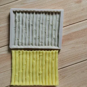 Detailed view of a bamboo texture silicone mold with a yellow finished sample.