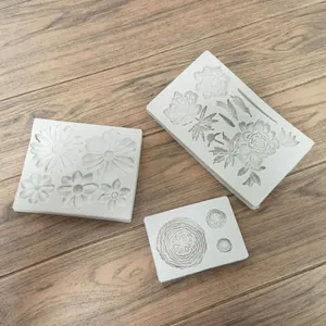 Set of diverse floral silicone molds for DIY chocolate and fondant cake decorating crafts