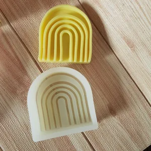 Detailed macro view of geometric arch silicone molds for DIY scented candle making