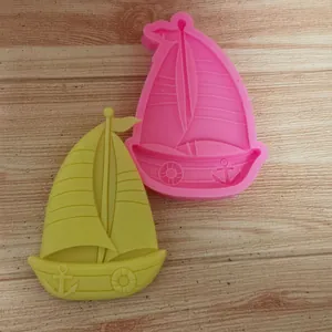 Detailed view of two-piece sailboat silicone mold for fondant, resin, and clay crafts