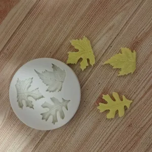 Detailed view of maple leaf silicone mold for cake decoration and chocolate making.