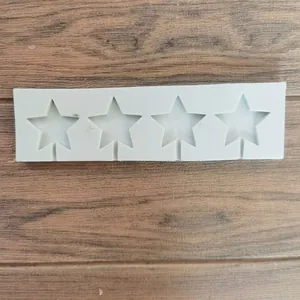 Detail view of 4-cavity star-shaped silicone lollipop mold for fondant and chocolate