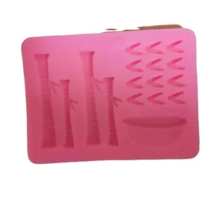 Professional pink silicone mold featuring bamboo and leaf shapes for cake and fondant decor