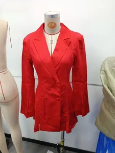 Red double-breasted blazer dress with flared sleeves and cinched waist on mannequin