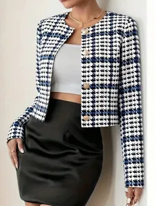 Detailed view of women's blue and white houndstooth cropped blazer with elegant gold buttons