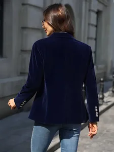 Detailed rear view of a premium navy blue velvet blazer with elegant metallic cuff buttons