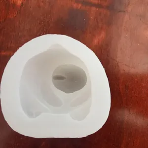 High-quality white silicone mold in a sitting bear shape for DIY candle and soap making
