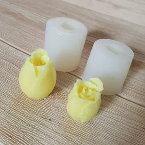 Detailed view of tulip flower silicone mold for candles and soaps with finished models