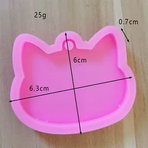Detailed view of pink cat head silicone mold with dimensions 6.3x6cm and 25g weight.