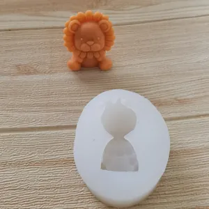 Detail view of cartoon lion silicone mold showing the finished orange lion figure